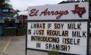 Board reading "What if soy milk is just regular milk introducing itself in Spanish?"